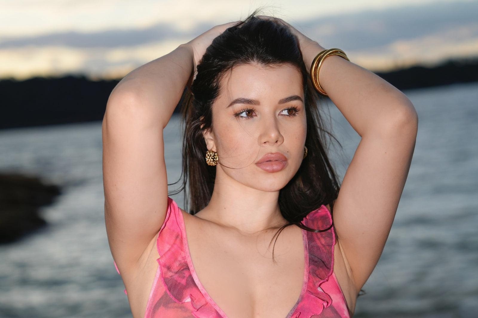 yagan jill wearing reliquia jewellery gold earrings, bracelet and necklaces