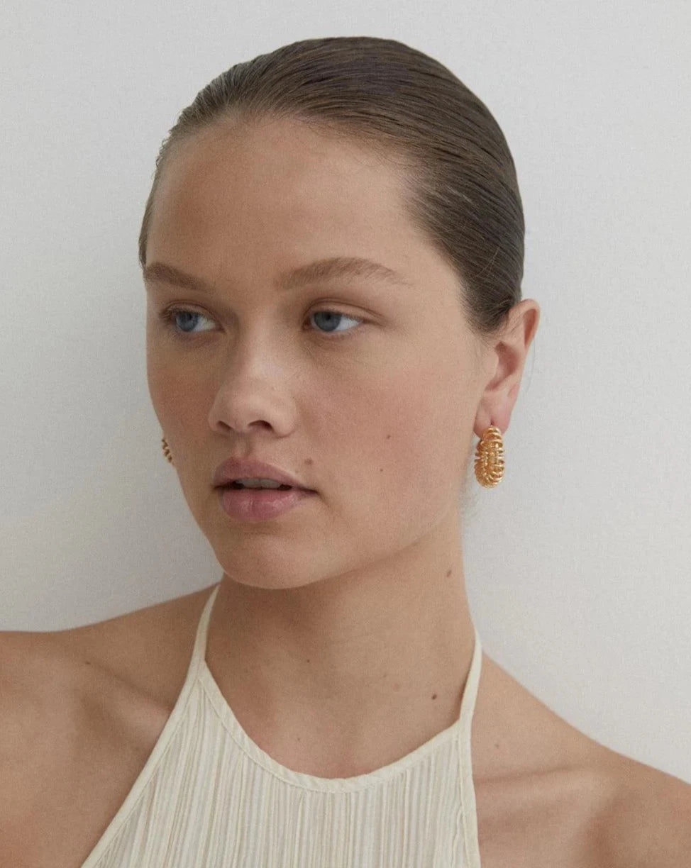 Reliquia spiral 2025 hoop earrings